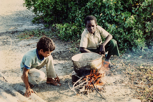 Jamaican boys cooking crab